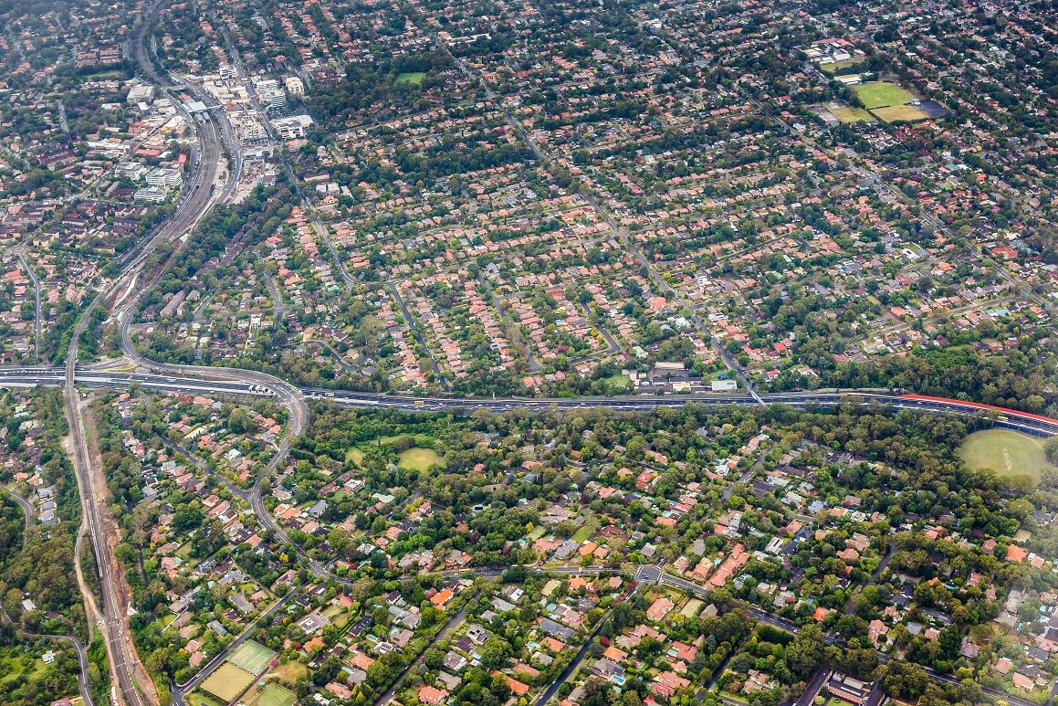 invest‑dha‑home-guaranteed-income-birds-view invest‑dha‑home-guaranteed-income-birds-view